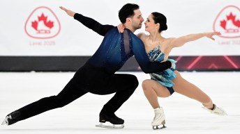 Deanna Stellato-Dudek and Maxime Deschamps perform a pair spin
