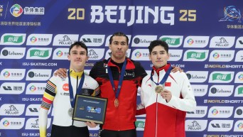Dandjinou (center) wins gold.