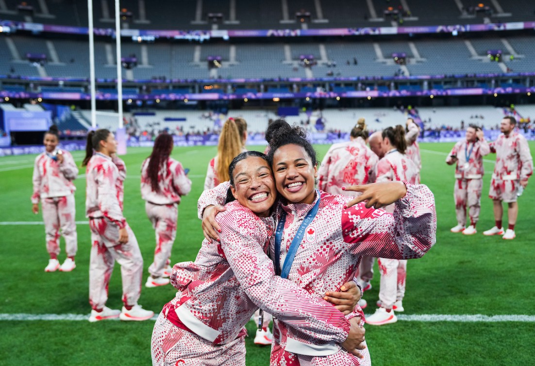 Asia Hogan-Rochester and Fancy Bermudez hug while wearing their silver medals at Paris 2024