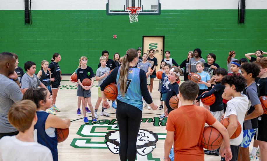 Paige Crozon coaches a group of youth