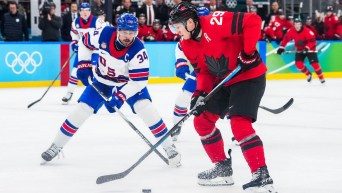 Nathan Mackinnon competes in ice hockey.