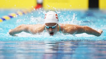 Summer McIntosh swims butterfly stroke