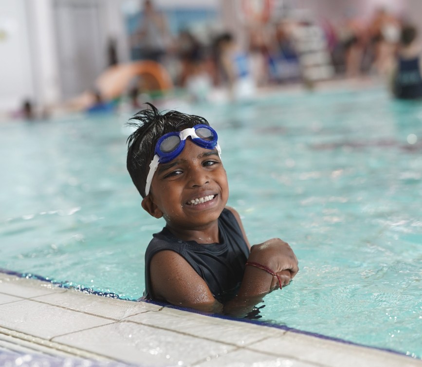 A young child in a swimming pool