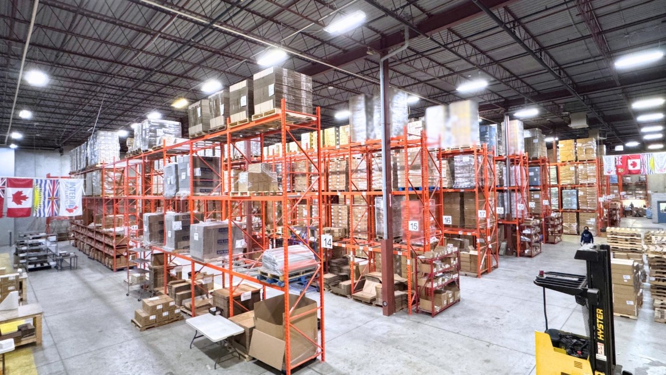 A warehouse with various shelves and boxes