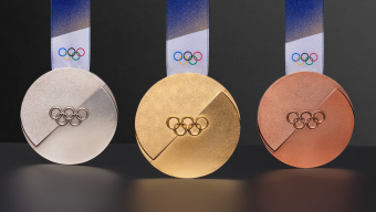 Renderings of the Milano Cortina 2026 silver, gold, and bronze medals