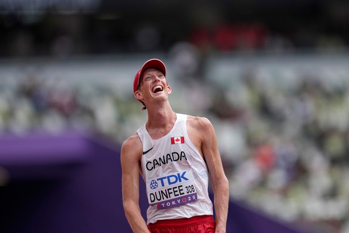 Evan Dunfee laughs and smiles