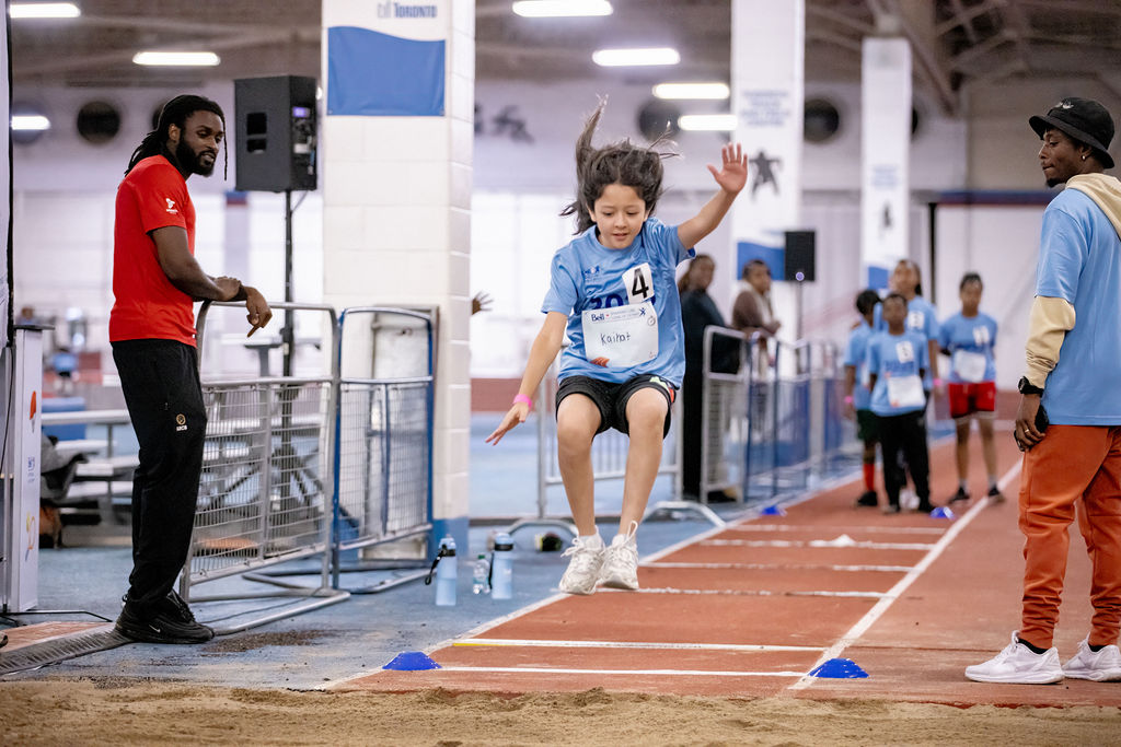 A child practices jumping at Bell Starting Line