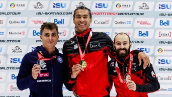 William Dandjinou (middle) wins gold at the ISU Short Track World Tour in Montreal