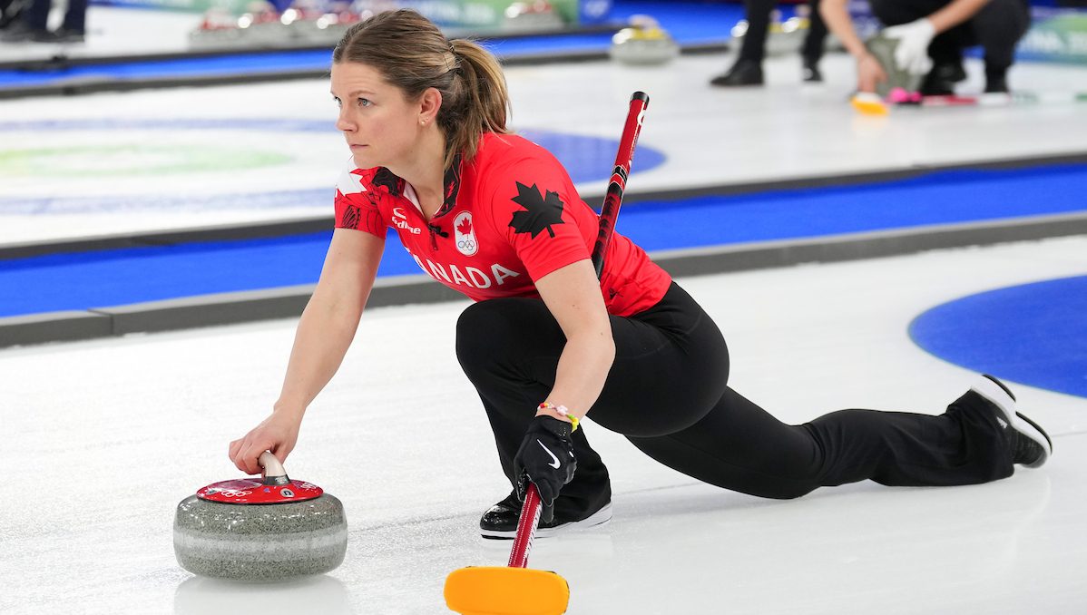Sarah Wilkes throws a rock.