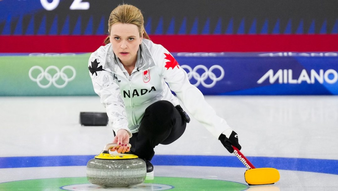 Tracy Fleury throws a rock.