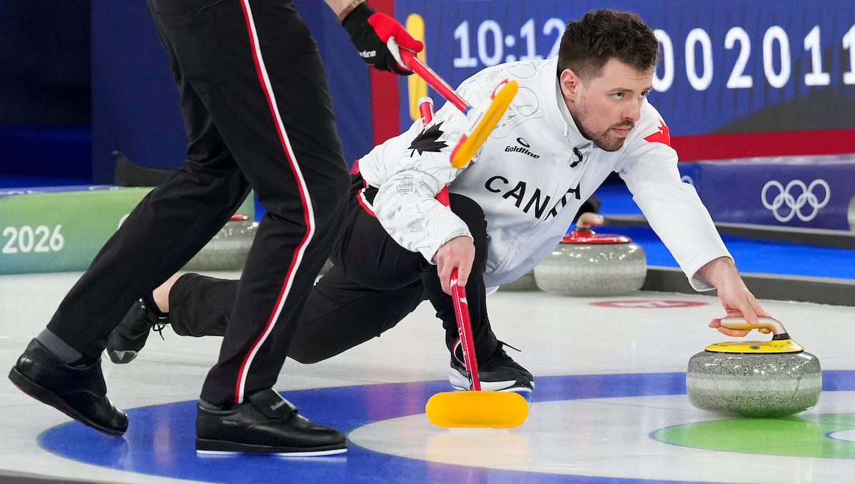 Tyler Tardi throws a rock.