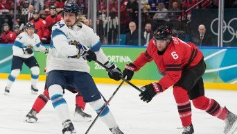 Travis Sanheim competes in ice hockey.