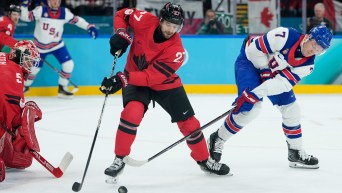 Shea Theodore competes in ice hockey.