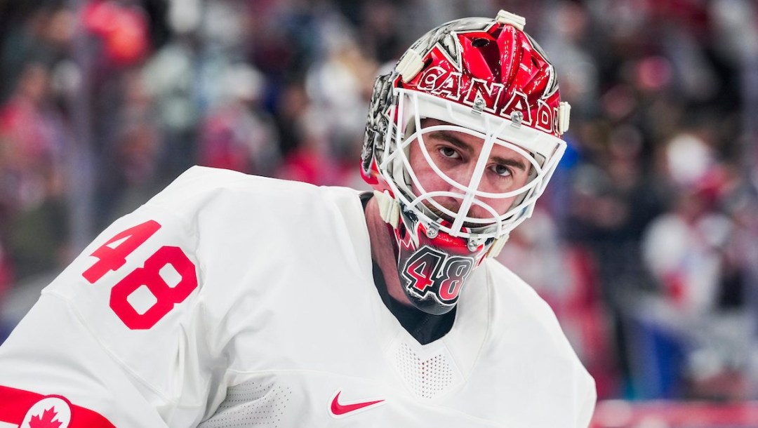 Logan Thompson competes in ice hockey.
