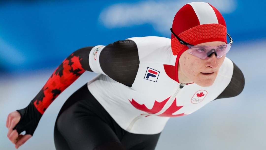 Laura Hall competes in long track speed skating.