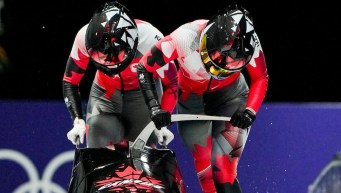 Sky;ar Sieben competes in bobsleigh.