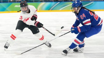 Sophie Jaques competes in ice hockey.