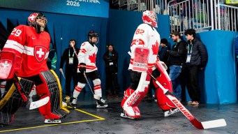 Kayle Osborne competes in ice hockey.