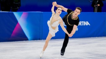 Trennt Michaud competes in figure skating.