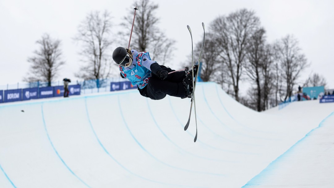 Dillan Glennie competing in ski halfpipe