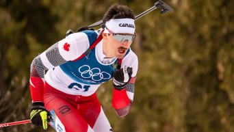 Zachary Connelly competes in biathlon.