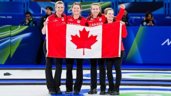 Emma Miskew, Sarah Wilkes, Rachel and Tracy Fleury celebrate