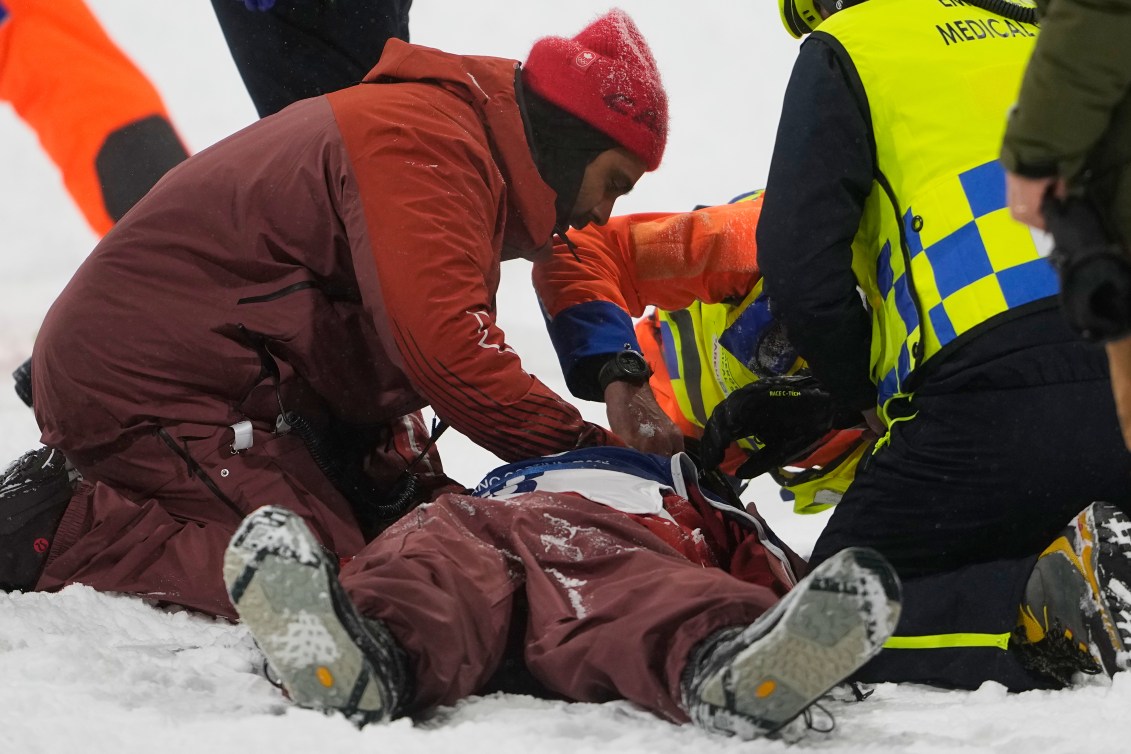 People tend to Mark McMorris after his crash on Feb. 4.