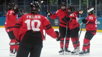 Canada celebrates scoring a goal
