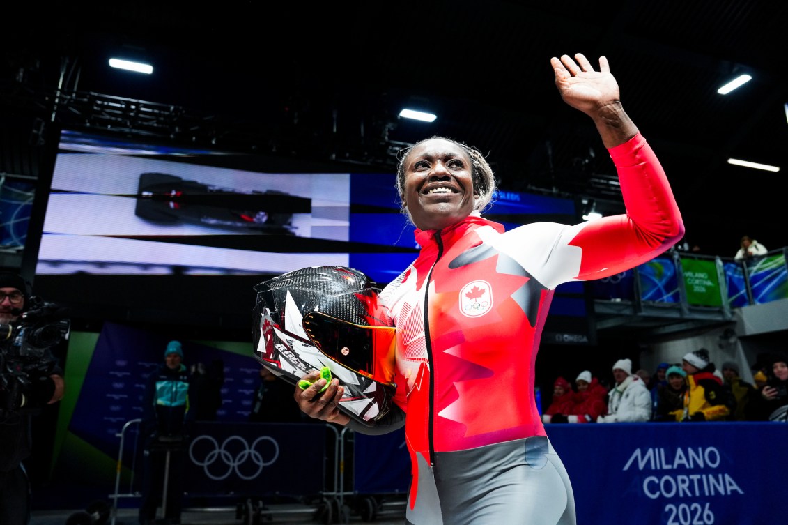 Team Canada's Cynthia Appiah reacts as she arrives at the finish