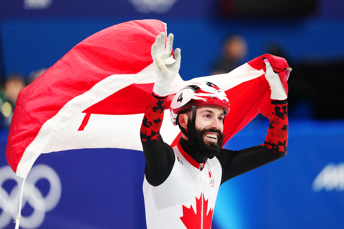 Team Canada’s Steven Dubois celebrates winning gold in short track speed skating men’s 500m at the Milano Cortina 2026 Olympic Winter Games in Milan, Italy on Wednesday, February 18, 2026. Photo by Leah Hennel/COC