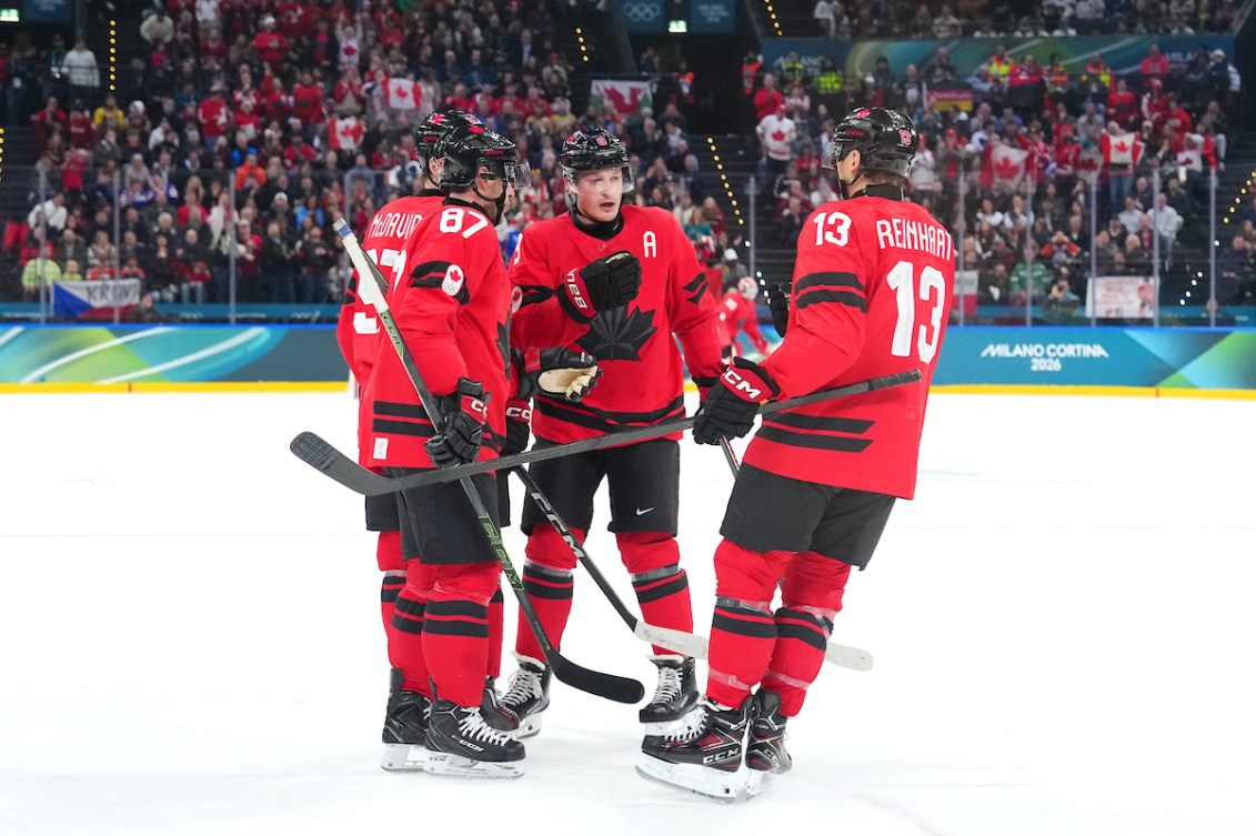 Connor McDavid, Sidney Crosby, Cale Makar and Sam Reinhart celebrate a goal