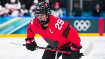 Marie-Philip Poulin waits on a face off