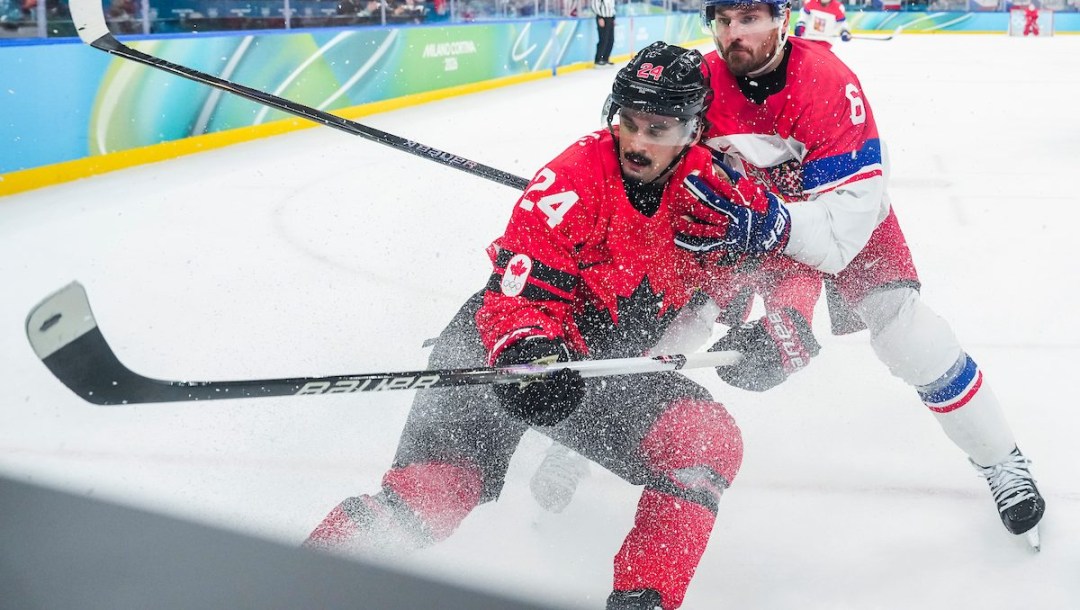 Seth Jarvis competes in ice hokey.