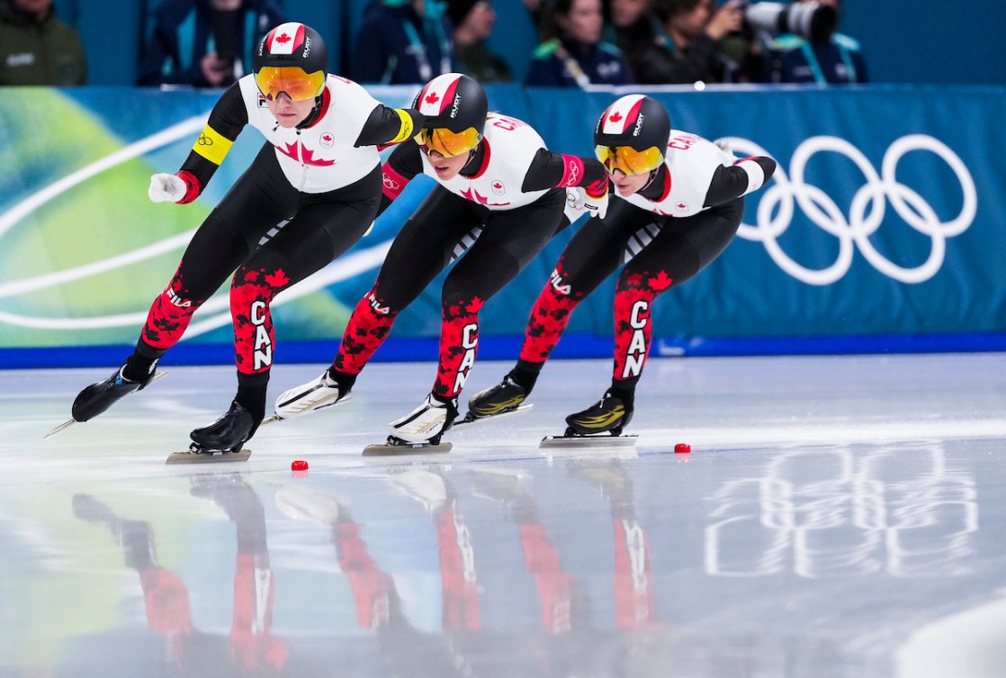 Isabelle Weidemann, Valerie Maltais, and Ivanie Blondin skate in the team pursuit