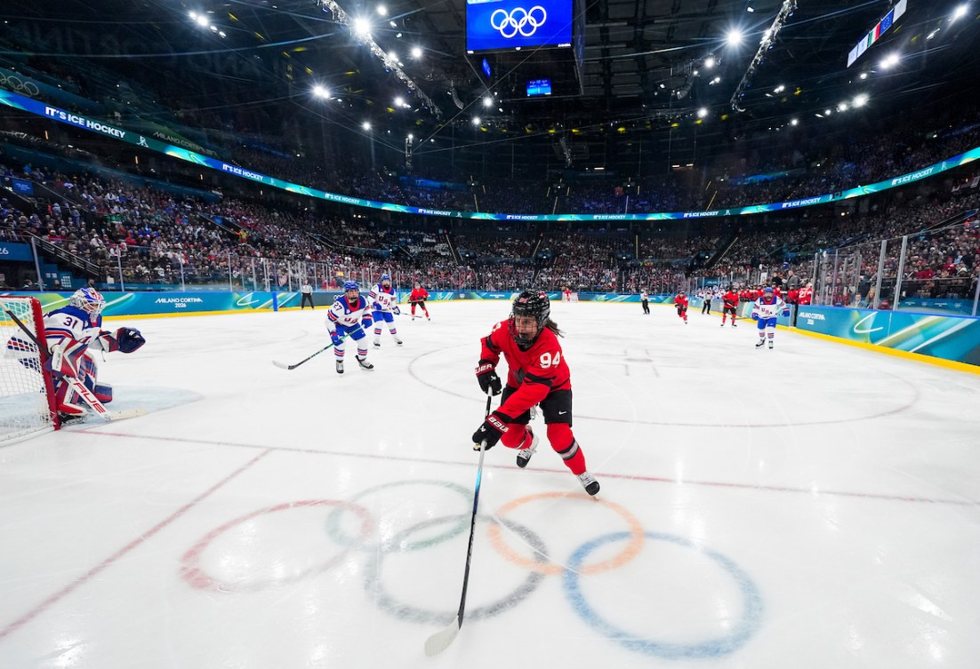Jennifer Gardiner plays the puck