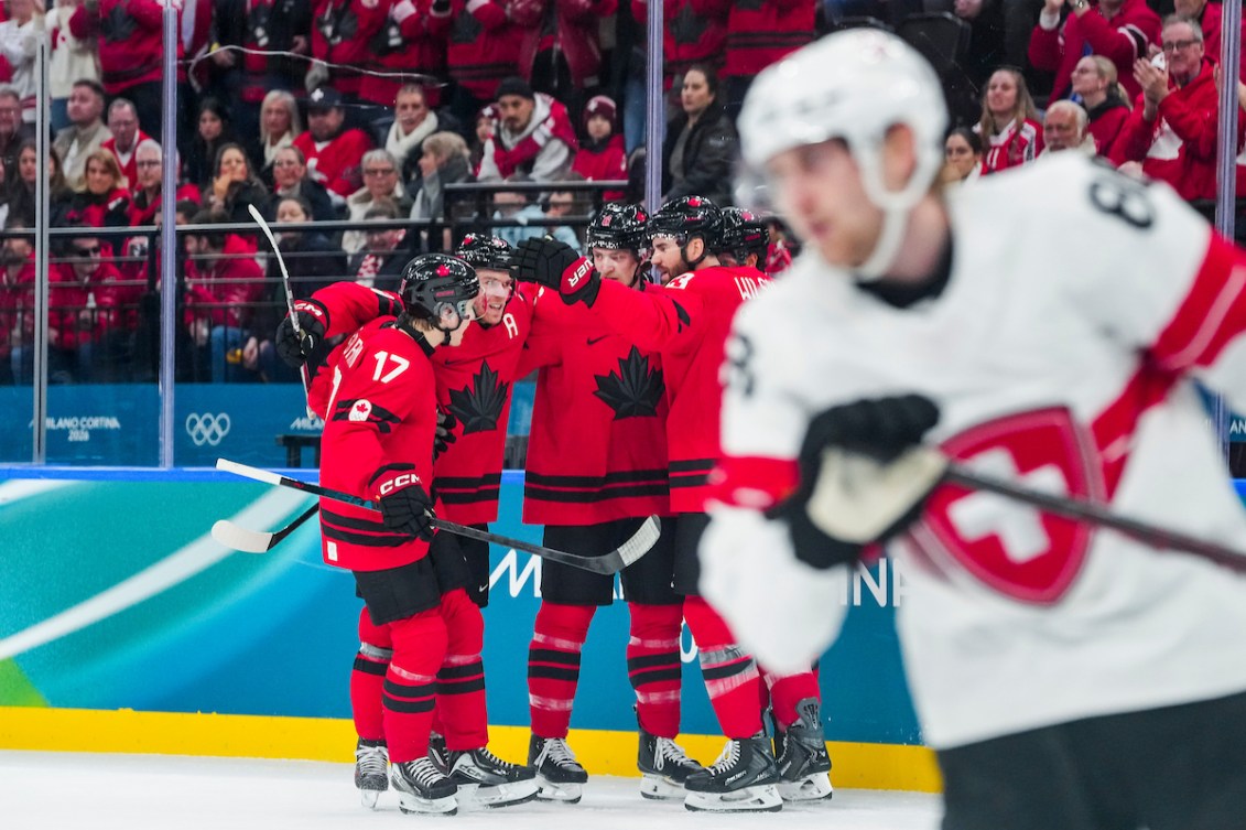 Team Canada celebrates scoring a goal