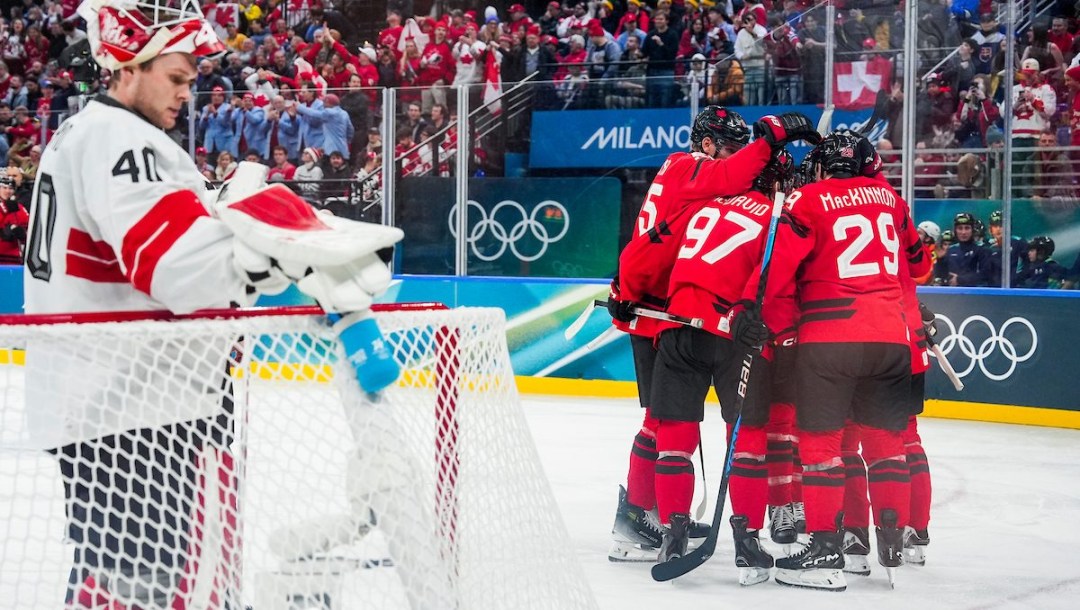 Team Canada celebrates scoring a goal