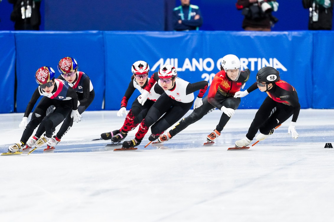 Team Canada’s Florence Brunelle and Courtney Sarualt compete in the Short Track Women's 3000m Relay semi-finals