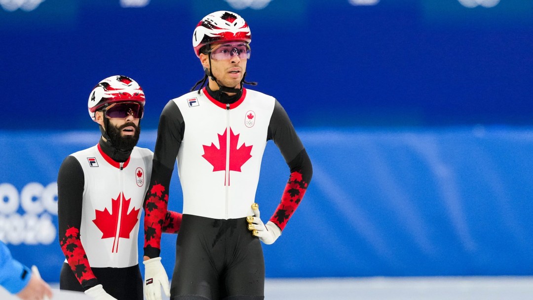 Steven Dubois and William Dandjinou react after the men's 1500m final