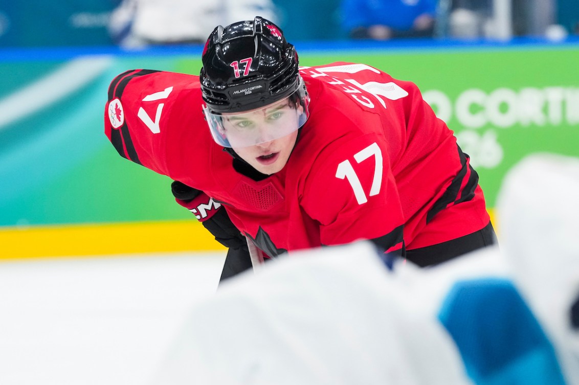 Macklin Celebrini looks on before a face off