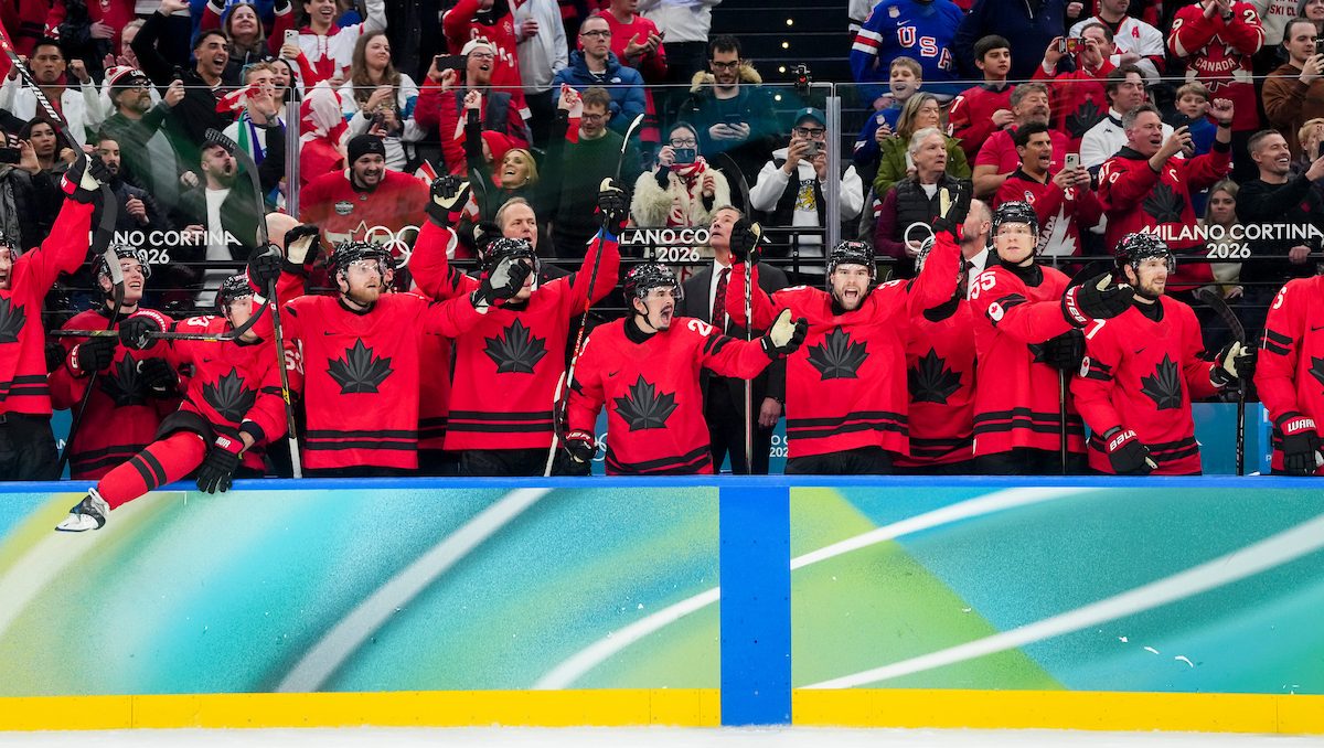 Team Canada’s bench celebrates defeating Finland