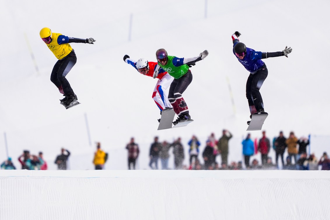 Eliot Grondin competes in the final of the men's snowboard cross