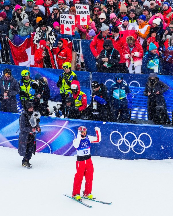 Lewis Irving celebrates after his jump with crowd.
