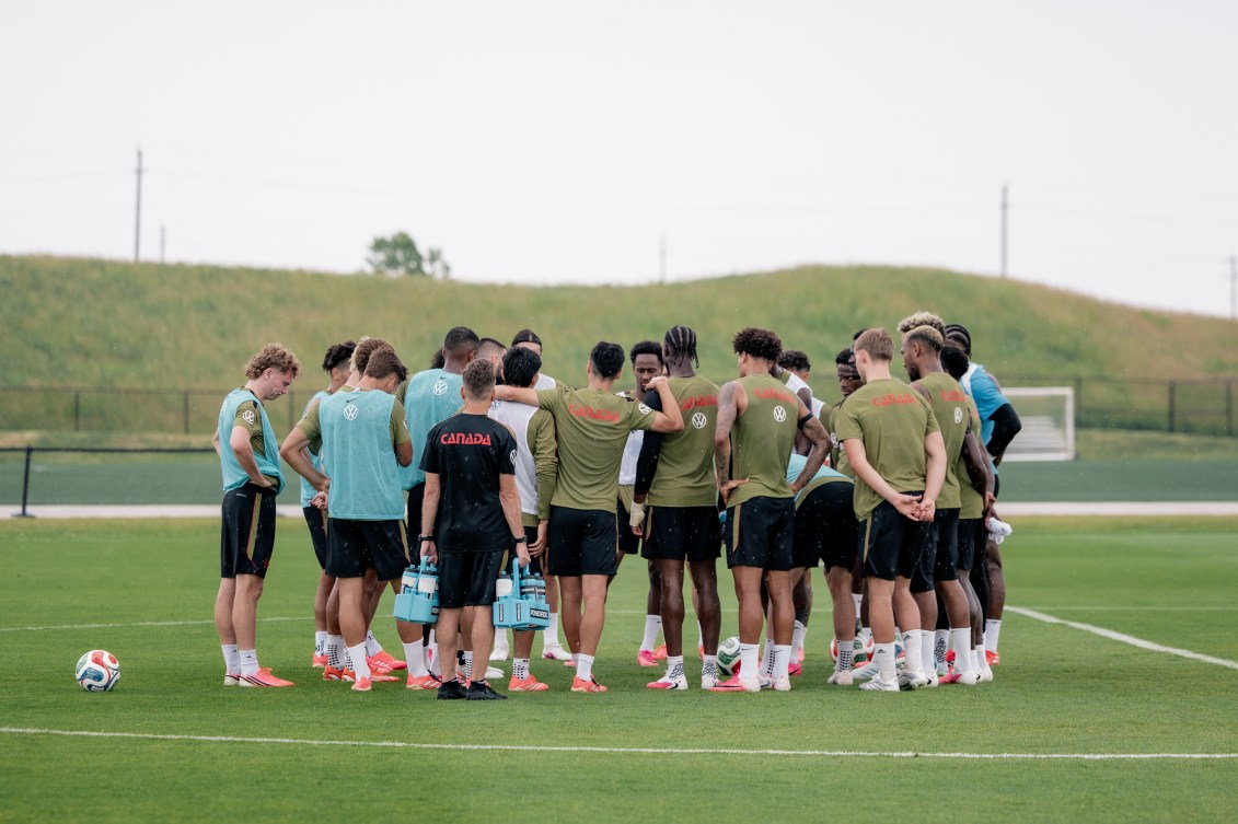 Canada players huddle during a training session ahead of their FIFA World Cup opening match.