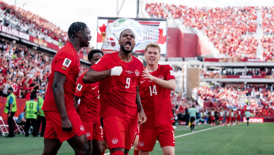 Cyle Larin and teammates celebrate after his goal against Bosnia and Herzegovina on Friday