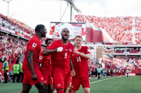 Cyle Larin and teammates celebrate after his goal against Bosnia and Herzegovina on Friday