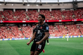 Jonathan David celebrates scoring against Qatar on Thursday.