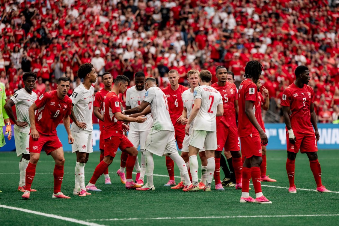 Canada and Switzerland players jostle for positioning during Wednesday's FIFA World Cup match.