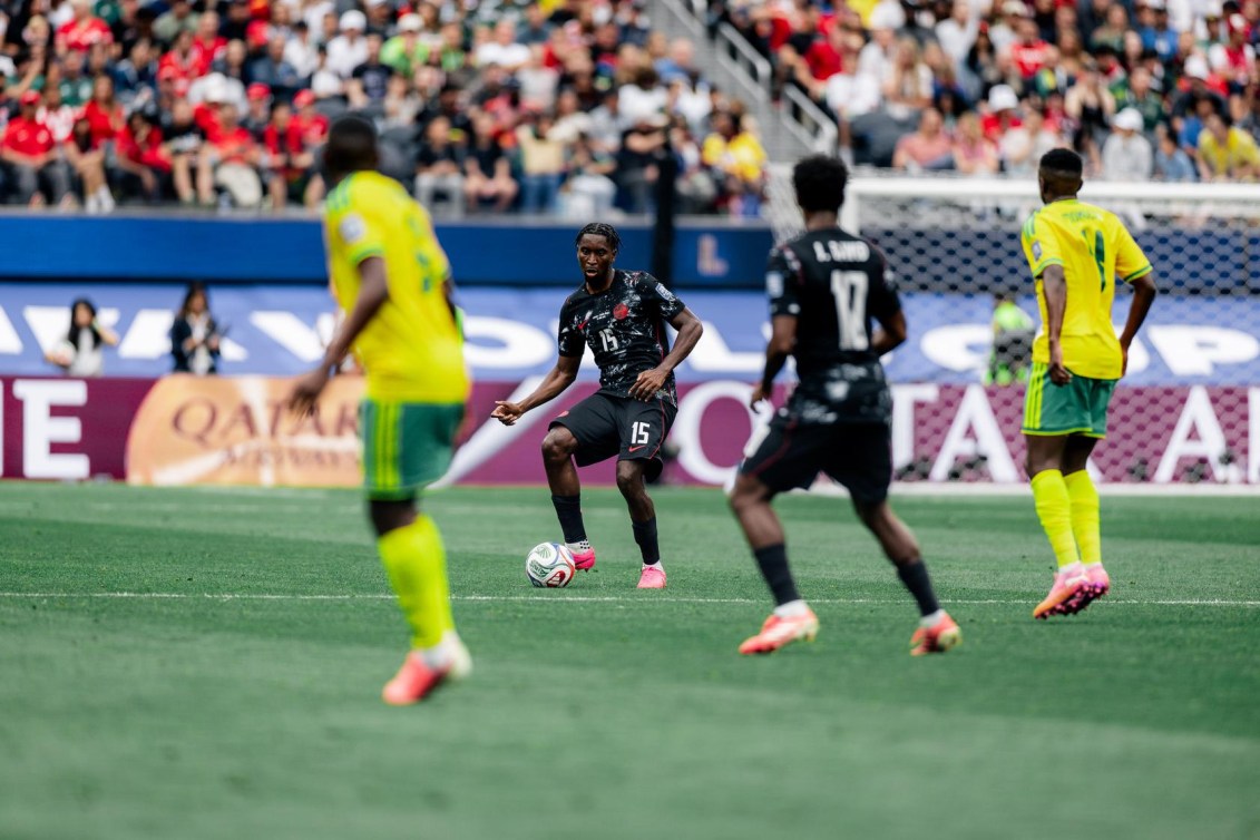 Canada's Moise Bombito attempts a pass in Sunday's FIFA World Cup match against South Africa.
