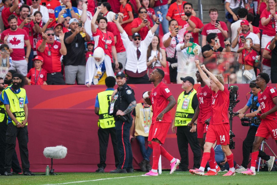 Canadian players celebrate Cyle Larin's goal on Friday